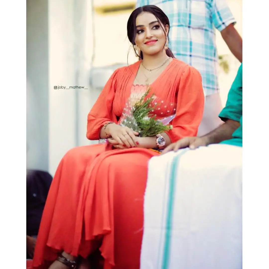 Malavika Menon In South Indian Traditional Orange Dress